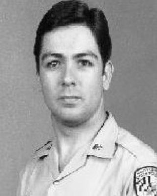 Gregory A. May