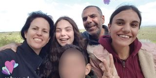 Yaniv Zohar, his wife Yasmin, and their two daughters, Keshet and Tehelet (Courtesy)