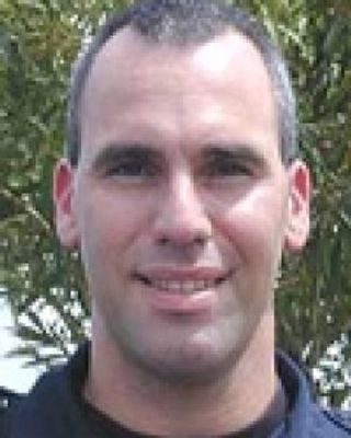 Eric Lewis Shuhandler