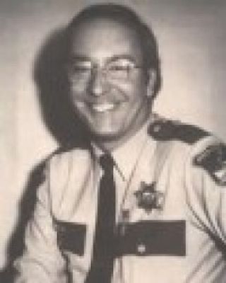 James E. Machado