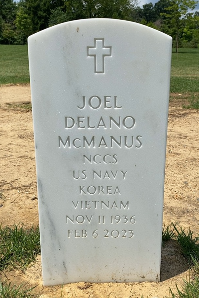 Headstone Front of Joel Delano Mcmanus. Arlington National Cemetery.
