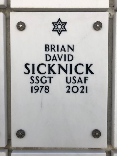 Columbarium niche cover of Staff Sergeant Brian David Sicknick, USAF, Arlington National Cemetery, Court 7, Section RR, Column 4, Niche 2.